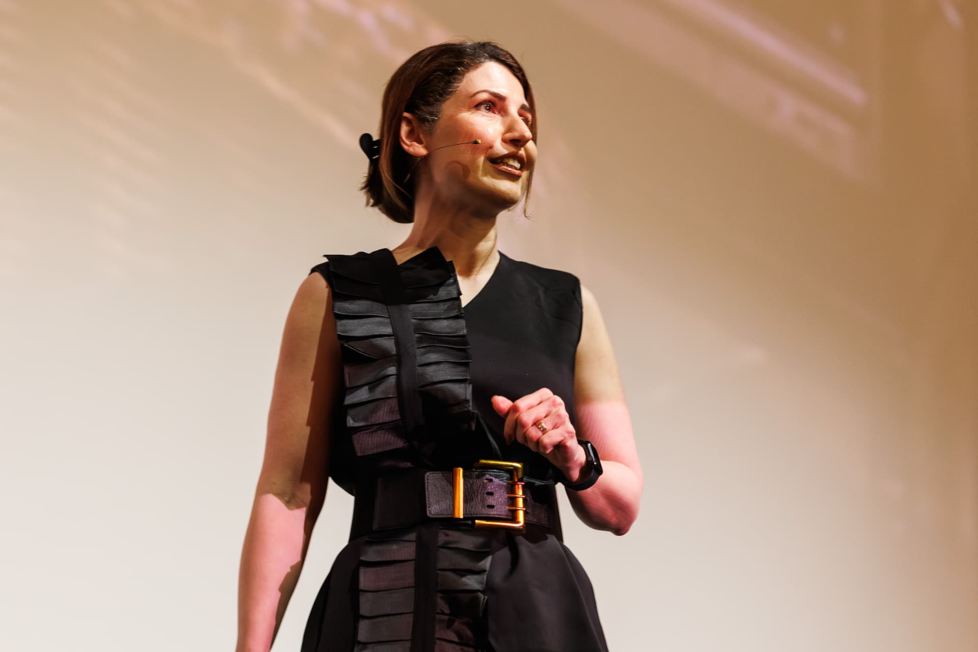 Dr. Neda Maria Kaizumi speaking to international audiences